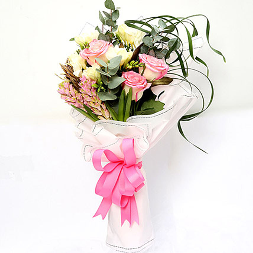 Endearing Roses and Freesia Bouquet: Anniversary Gifts for Parents