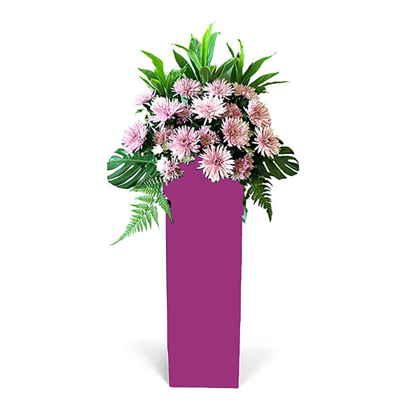 Elegant Pink Flowers Arrangement In Pink Stand: Gerbera Bouquet