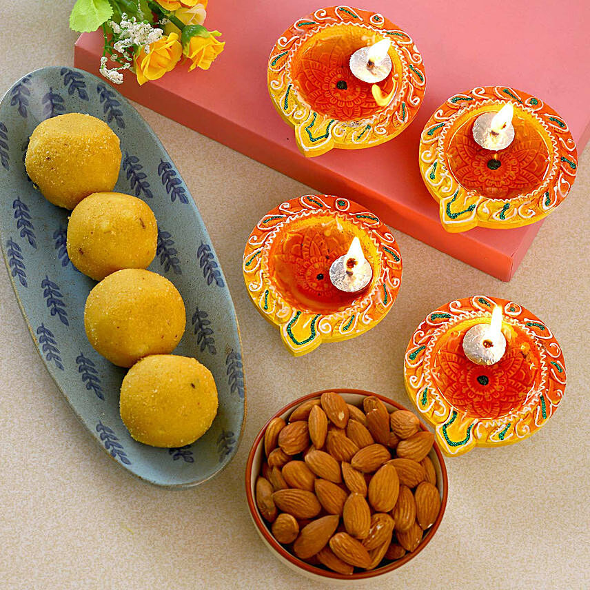Designer Diyas With Almonds And Besan Ladoo: Sweets 