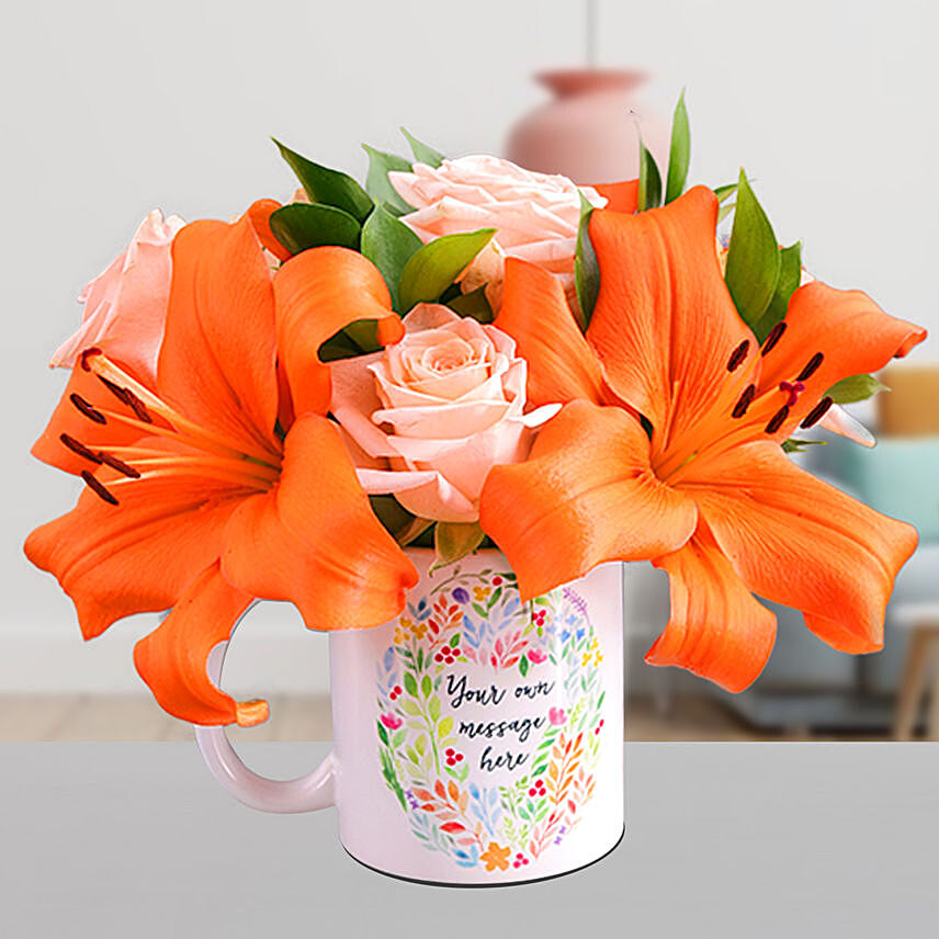 Enticing Mixed Flowers In Floral Mug: Apology Flowers