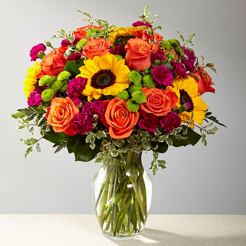 Vibrant Mixed Flowers Glass Vase: Easter Gift Ideas