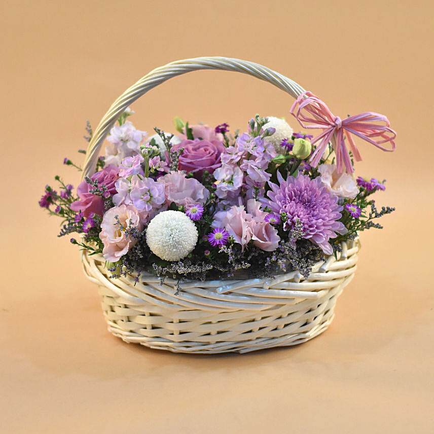 Enticing Mixed Flowers Round Basket: Flower Baskets