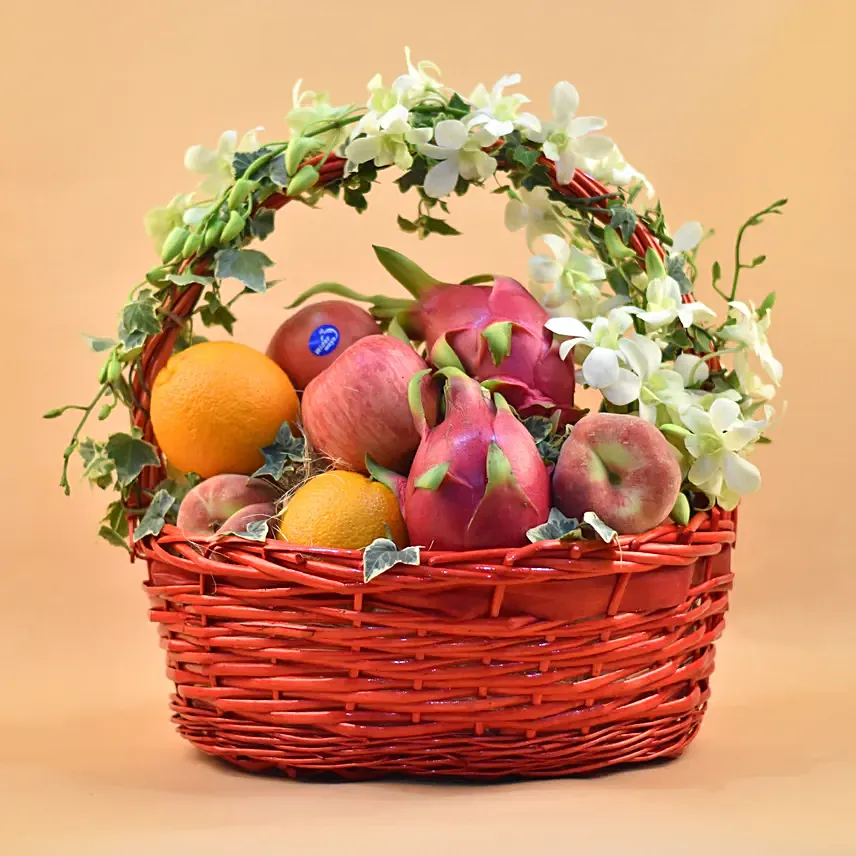 Dendrobium & Assorted Fruits Red Oval Basket: Wellness Hampers