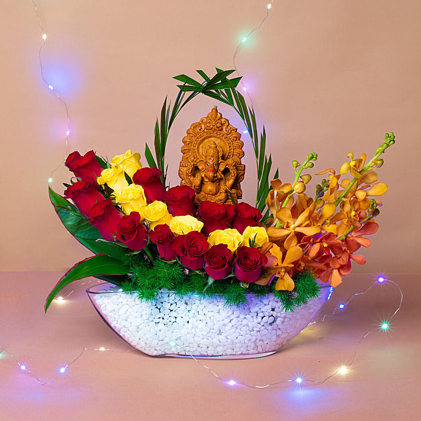 Colourful Flowers N Ganesha Idol Ship Shaped Vase: Flowers For Diwali