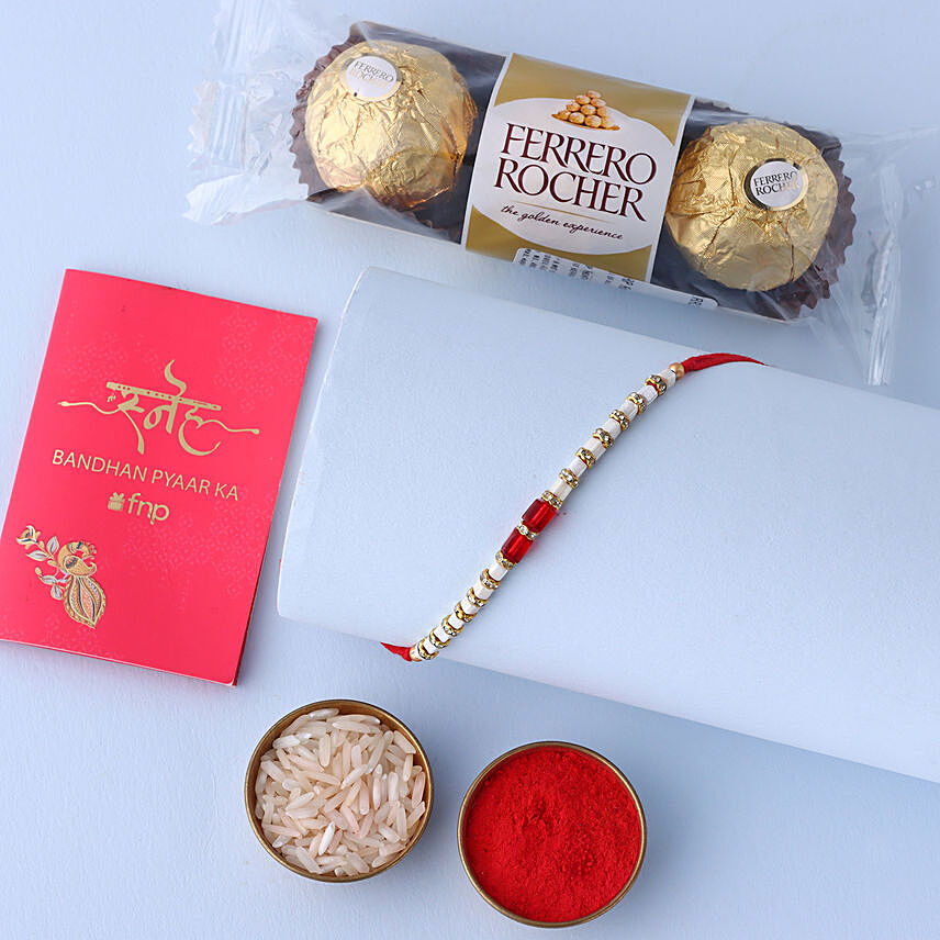 Sneh White and Red Bead Rakhi with Ferrero Rocher: Rakhi With Chocolates
