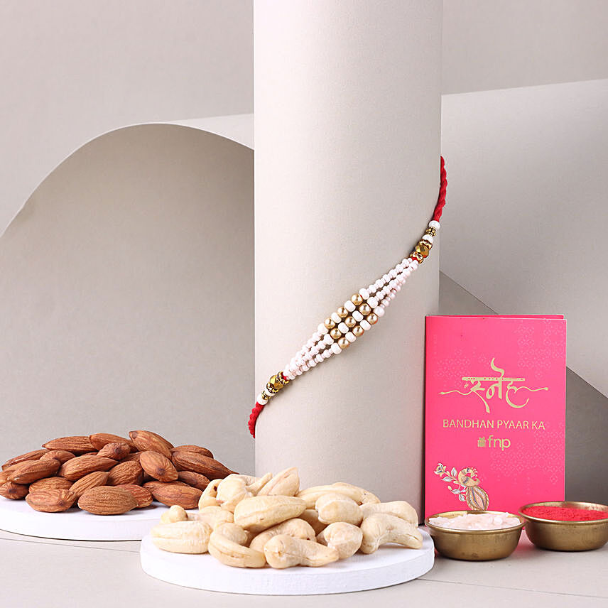 Sneh White Pearl Bead Rakhi with Almonds: Rakhi With Dryfruits