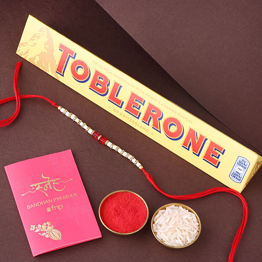 Sneh White and Red Bead Rakhi with Toblerone Chocolate: 