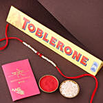 Sneh White and Red Bead Rakhi with Toblerone Chocolate