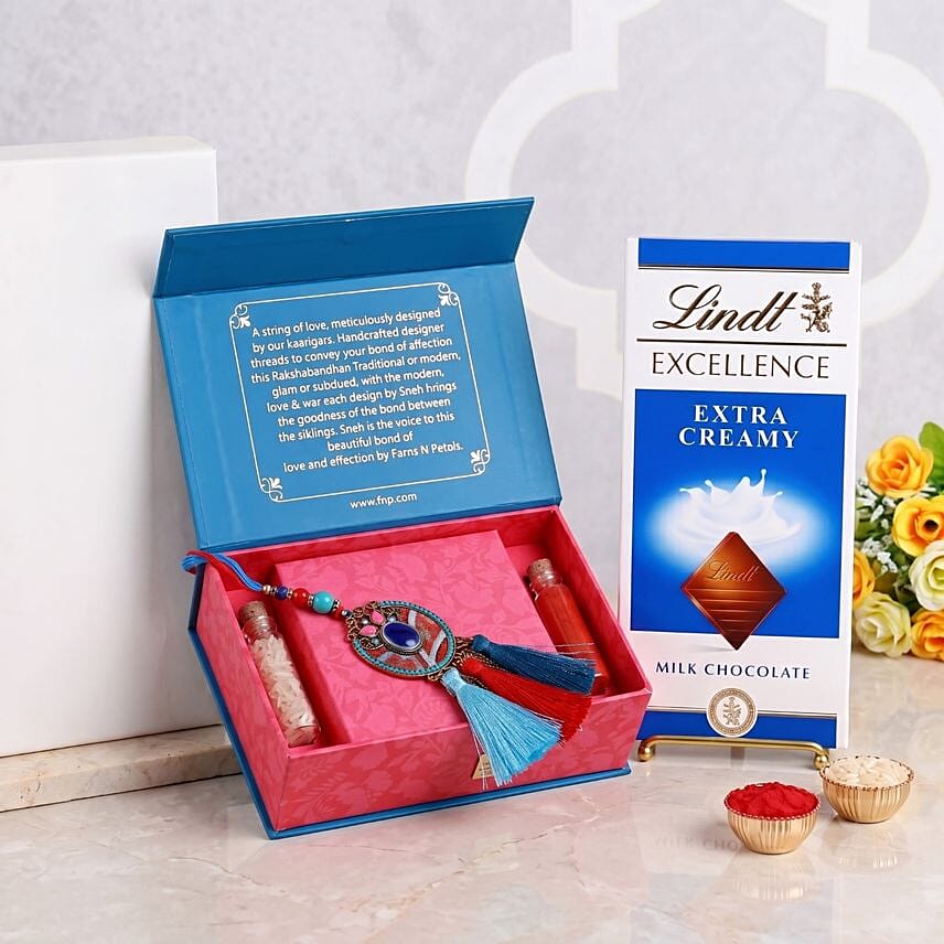 Sneh Blue Lumba Tassle Rakhi with Lindt Bar