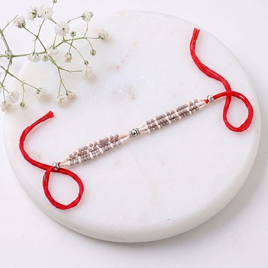Sneh Exquisite Pearl Rakhi with Rasgulla
