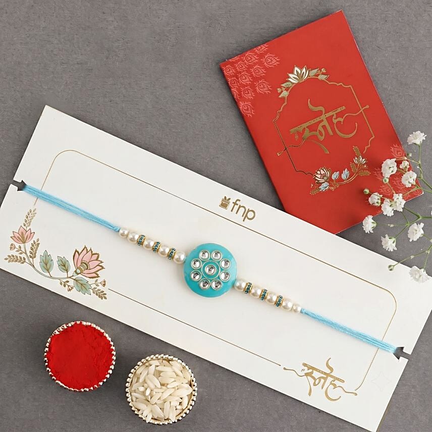 Sneh Mesmerising Kundan Sky Blue Rakhi for Brothers