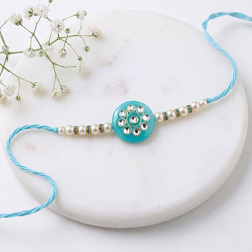 Sneh Mesmerising Kundan Sky Blue Rakhi with Rasgulla