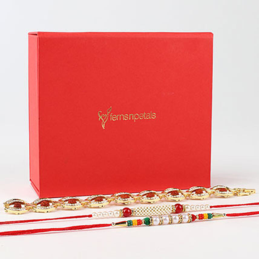 Dazzling Set of Three Rakhis In Red Box