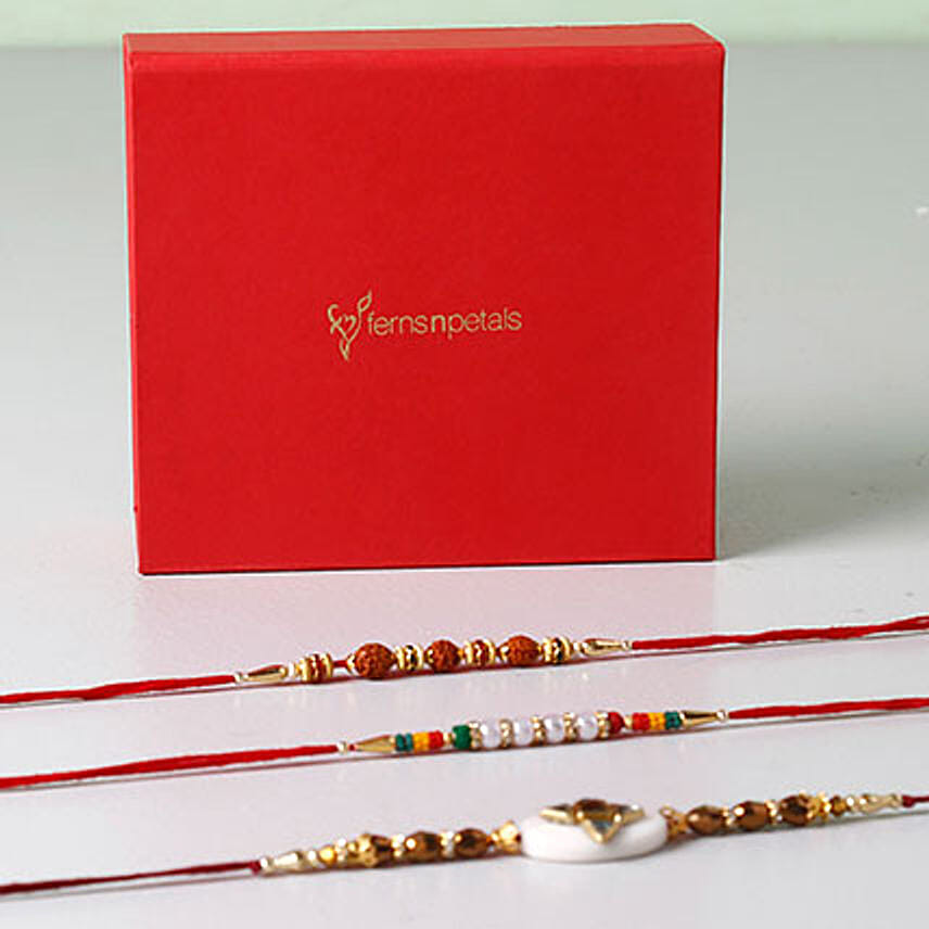 Set of 3 Vibrant Rakhis In Red Box