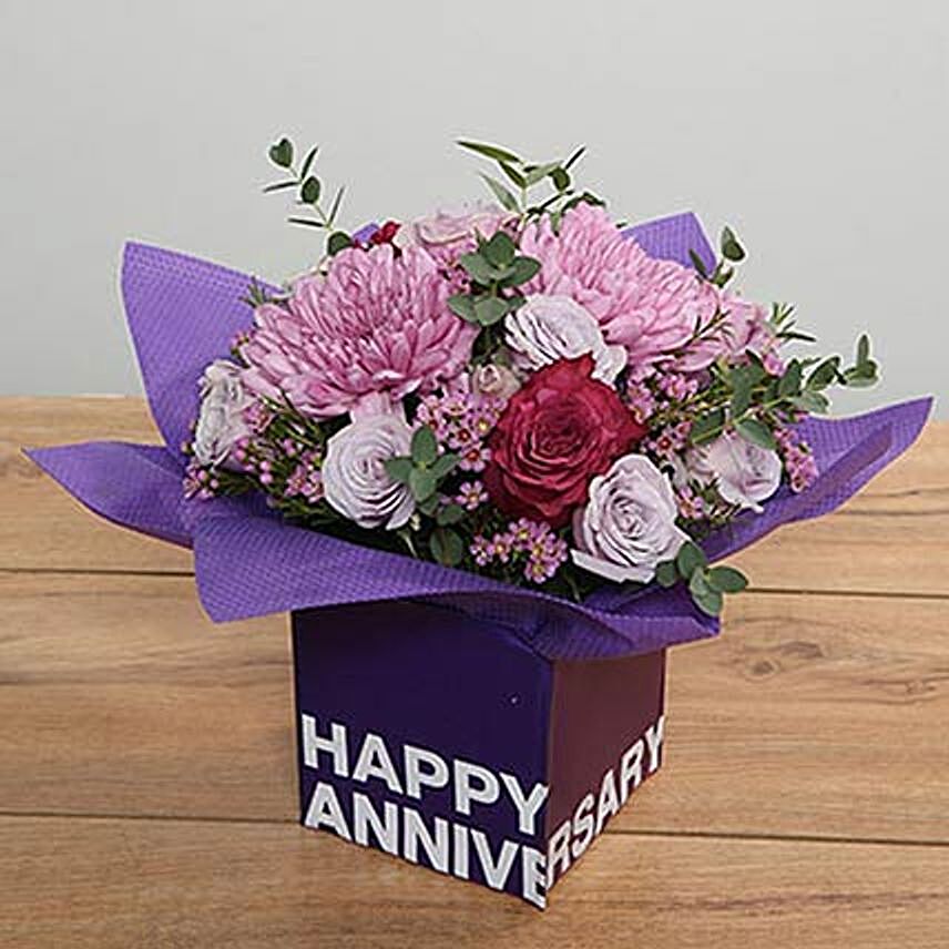 Purple Flowers Arrangement With Square Glass Vase