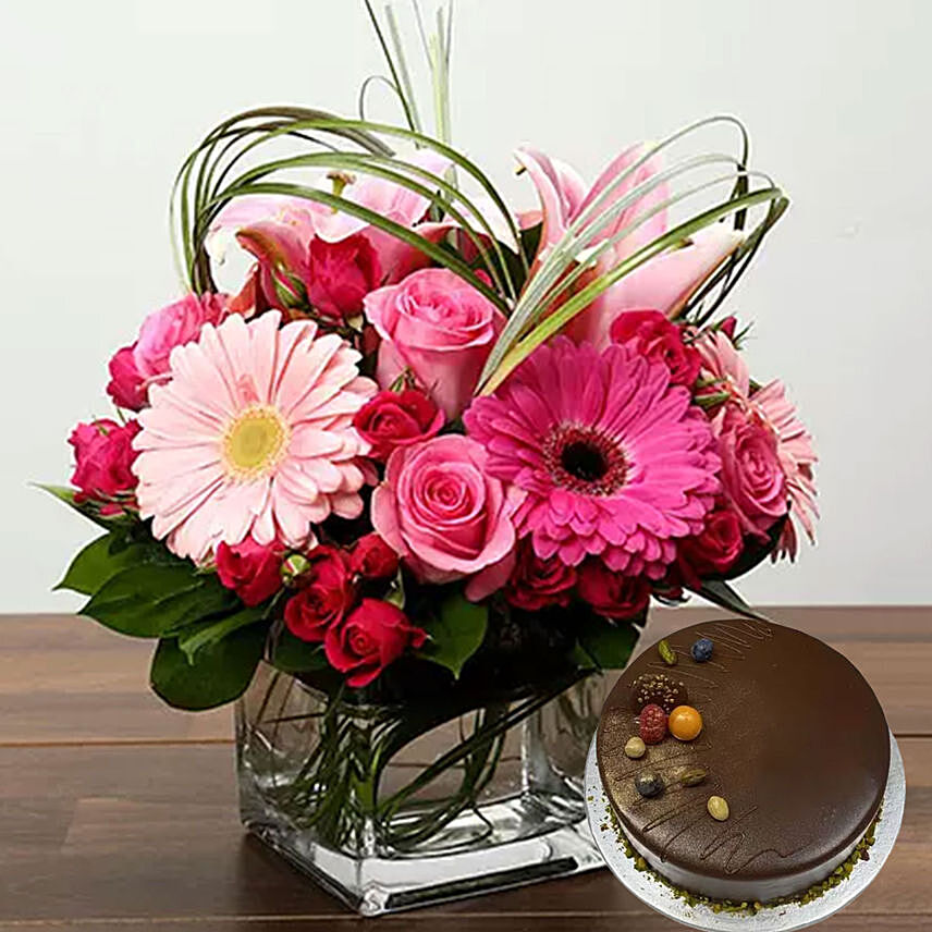 Online Pink Flowers In Glass Vase With Chocolate Cake Gift Delivery in ...