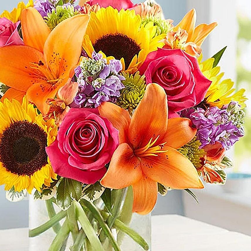 Vivid Bunch Of Flowers In Glass Vase Add