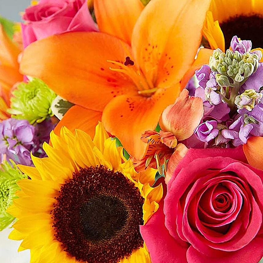 Vivid Bunch Of Flowers In Glass Vase Add