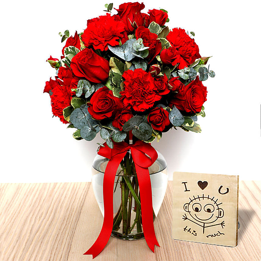 Red Flowers In Glass Vase With I Love You Table Top For Valentines