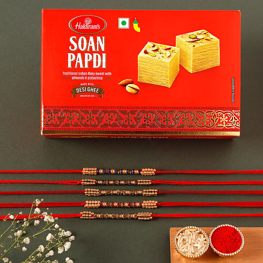 Sneh Colourful Pearl Rakhi Set & Soan Papdi