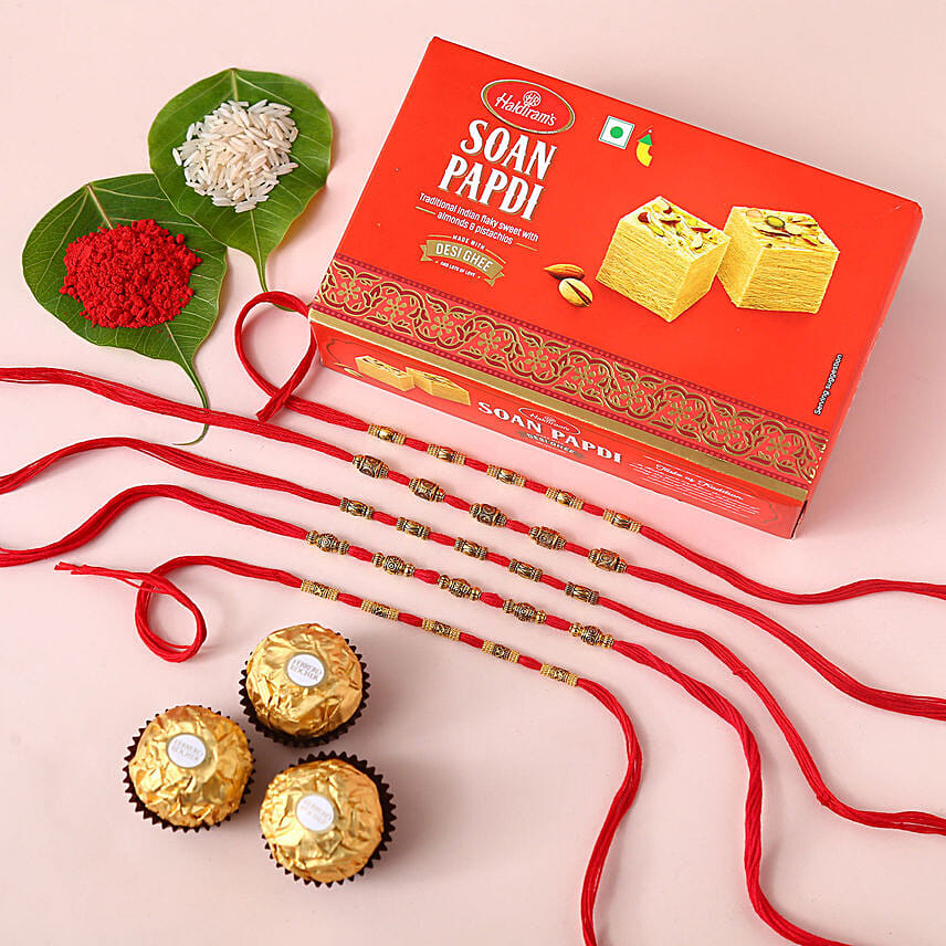 Sneh Charming Rakhis With Soan Papdi & Ferrero Rocher