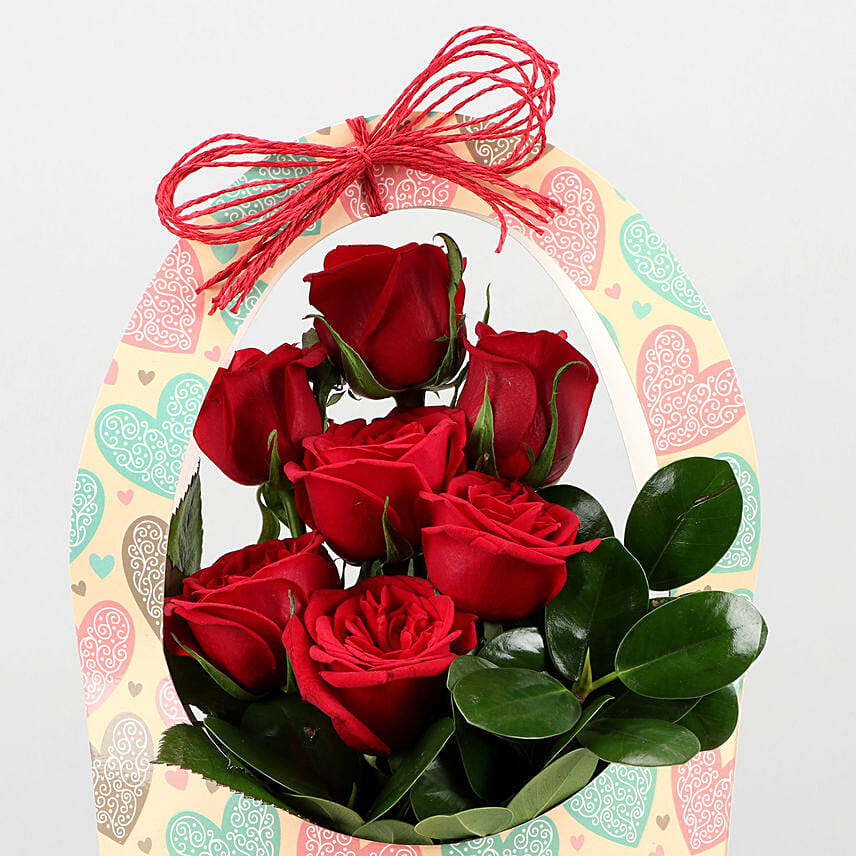 Red Roses In FNP Heart Sleeve Delivery in Singapore - FNP SG