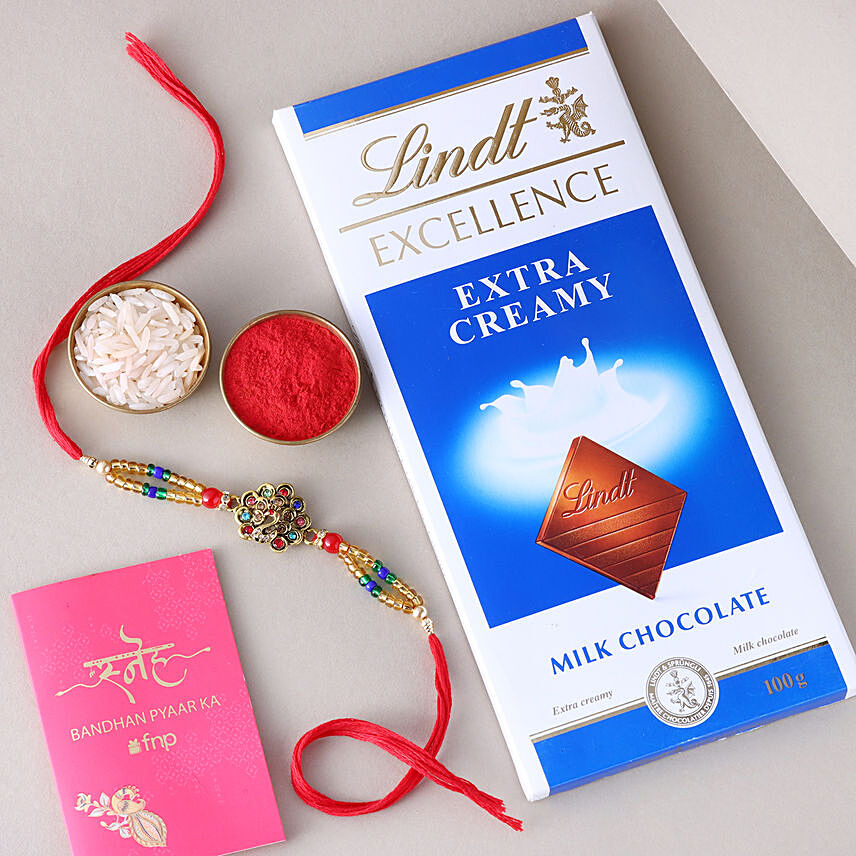 Sneh Designer Peacock Rakhi with Lindt Extra Creamy Milk Chocolate