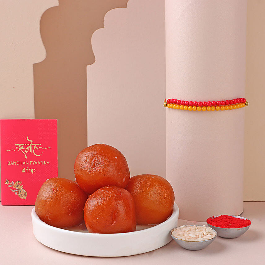 Sneh Red and Yellow Bead Rakhi with Gulab Jamun