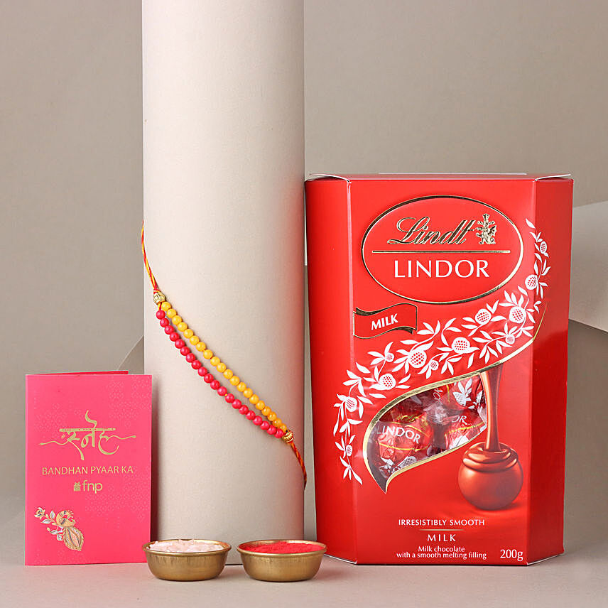 Sneh Red and Yellow Bead Rakhi with Lindt Lindor Chocolate Box