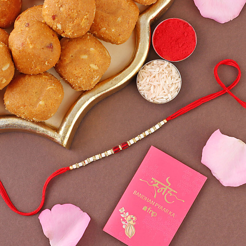 Sneh White and Red Bead Rakhi with Besan laddoo