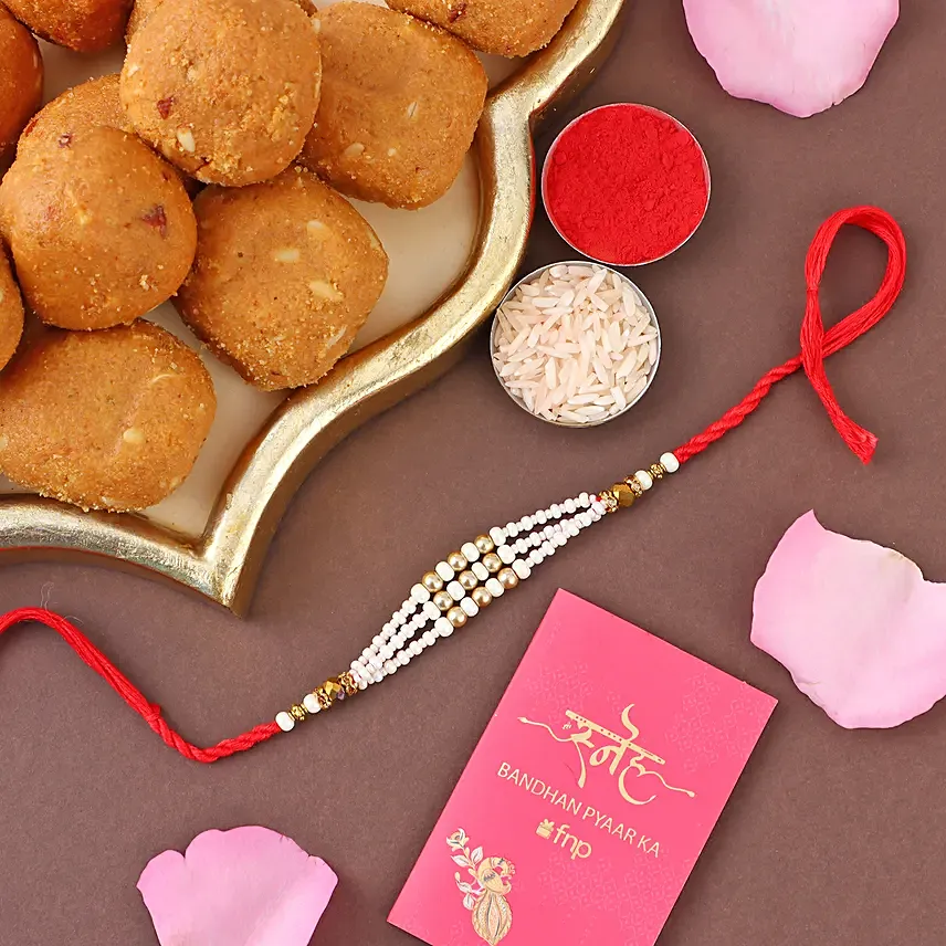 Pearl Bead Rakhi and Besan Ladoo Combo