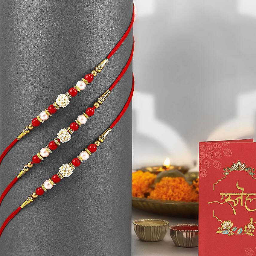 Pearl Rakhi Set of 3 with Almonds Delivery in Singapore - FNP SG