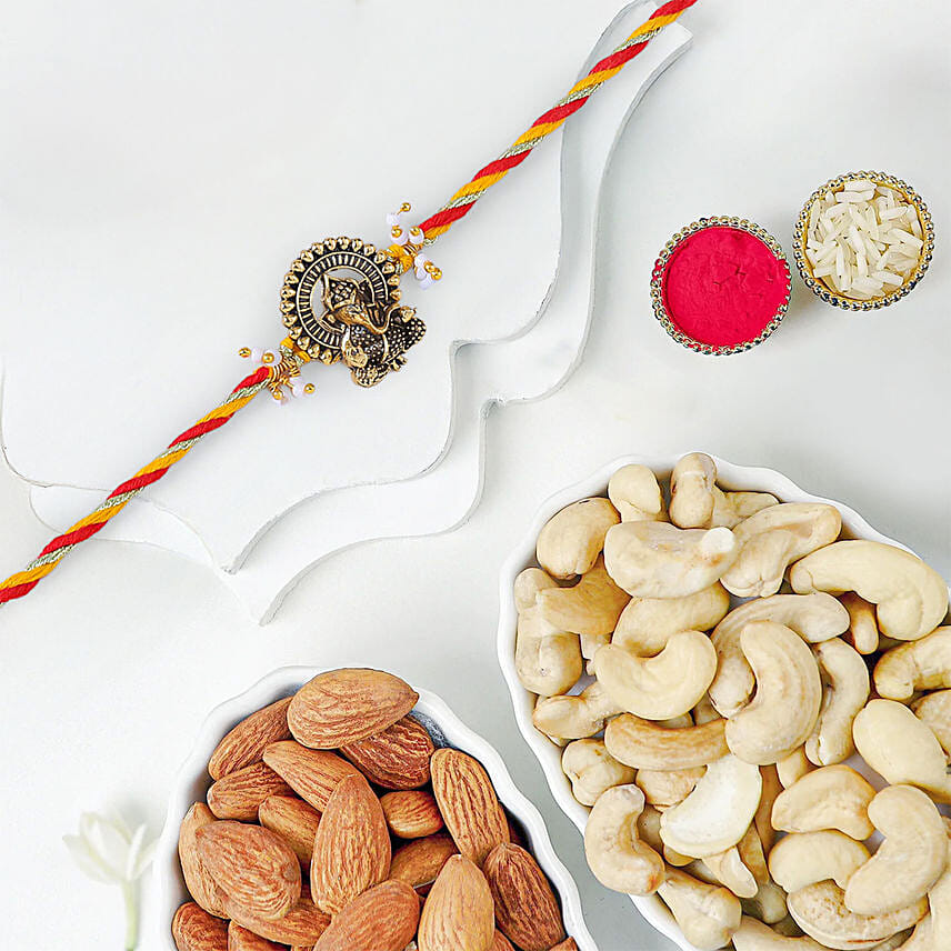 Luxe Ganesha Blessings Rakhi with Dryfruits: 