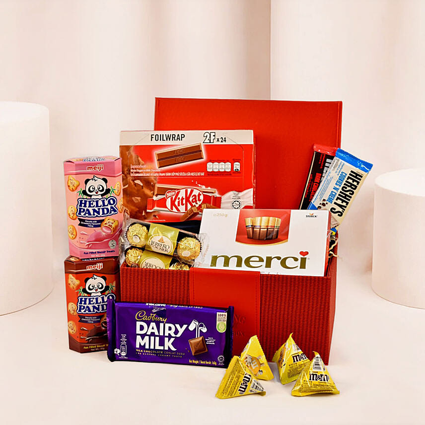 Delightful Treats Red Leather Basket: Chocolate Hampers Singapore