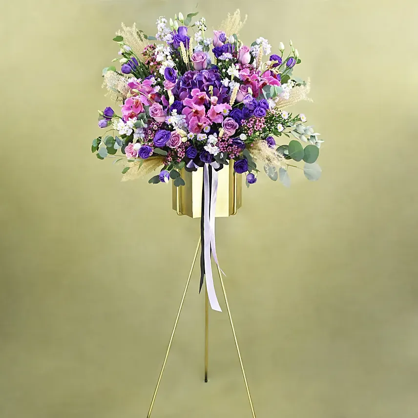 Mesmerising Purple & Pink Flowers Tripod Stand: Congratulatory Flower Stands