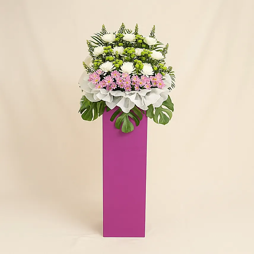 Blissful Mixed Flowers With Pink Stand: White Flowers