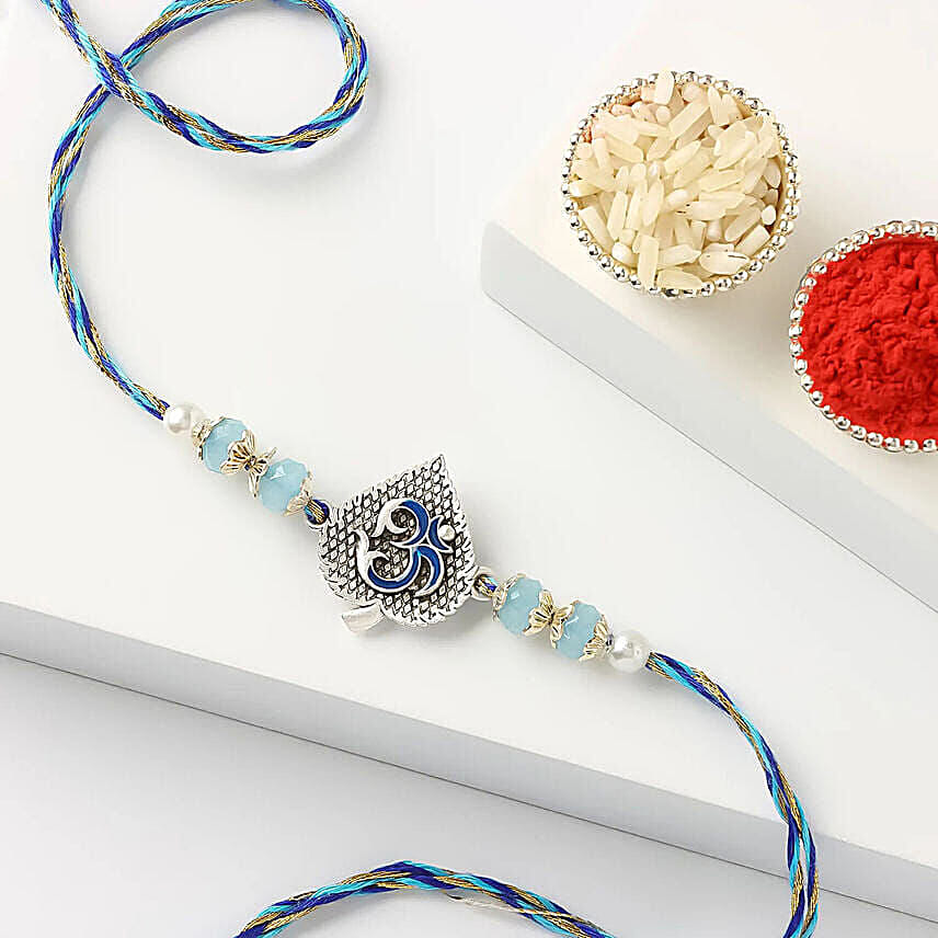 Blue Serenity Om Rakhi with Apple Airpods Pro 3