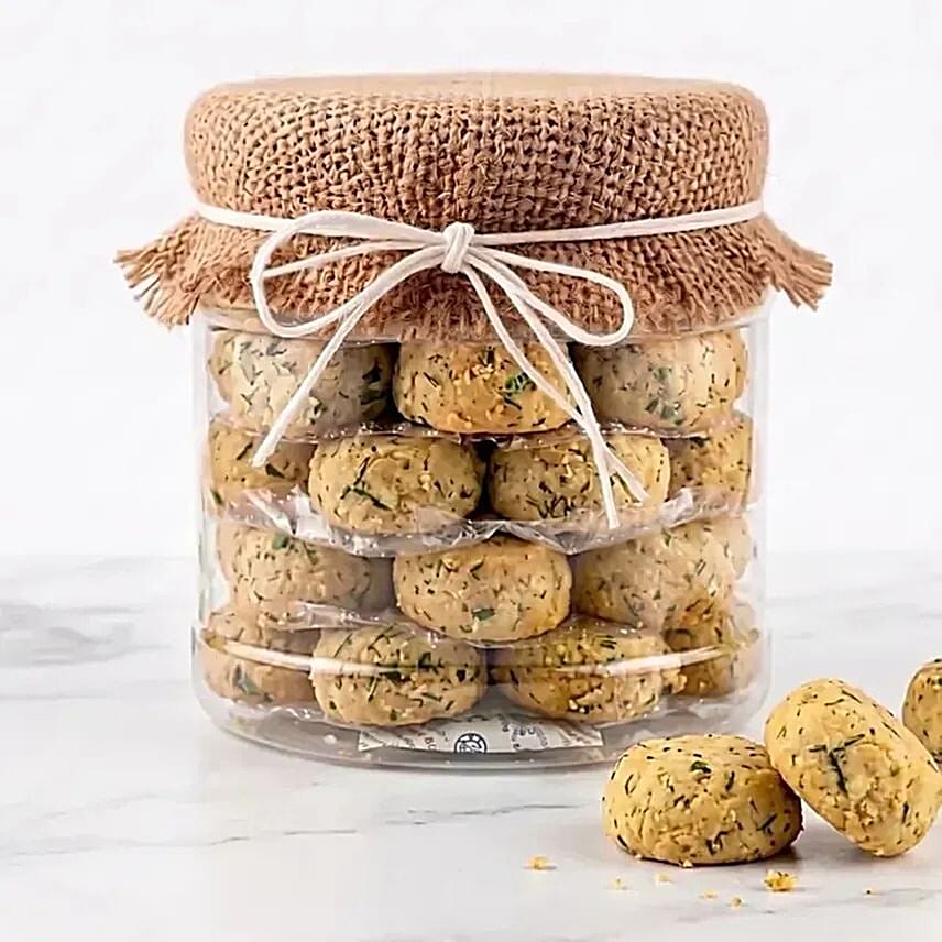 Designer Peacock Rakhi with Green Pea Cookies
