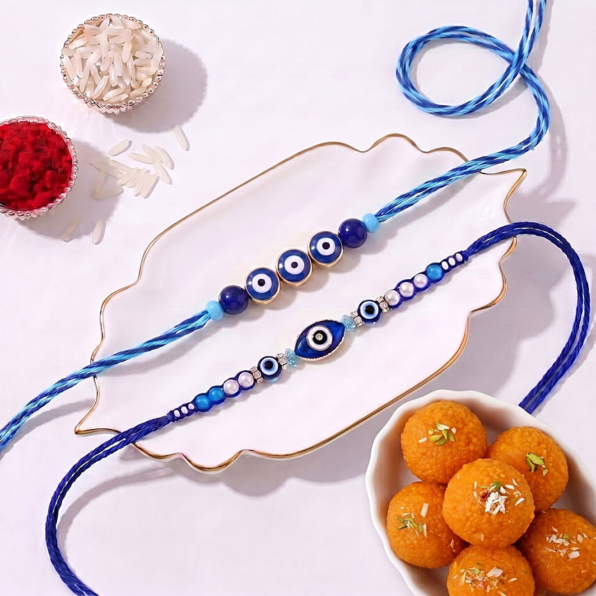 Feng Shui Evil Eye Rakhi Set with Motichoor Ladoo