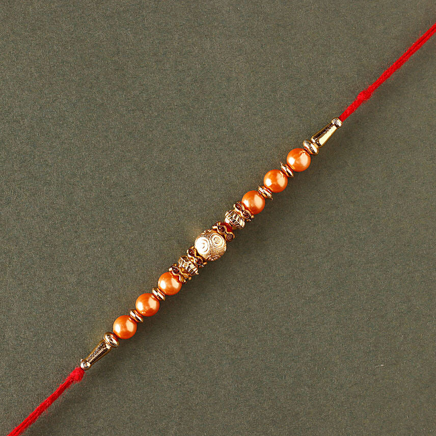 Sneh Rose Gold Rakhi & Rasgullas