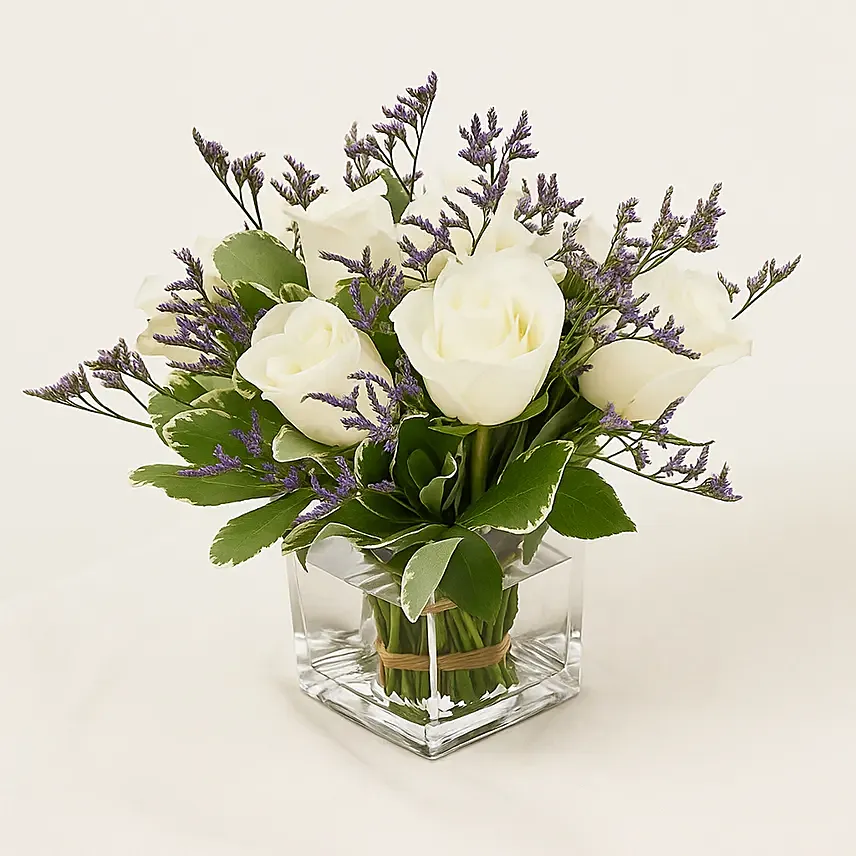 White Roses In A Vase: 