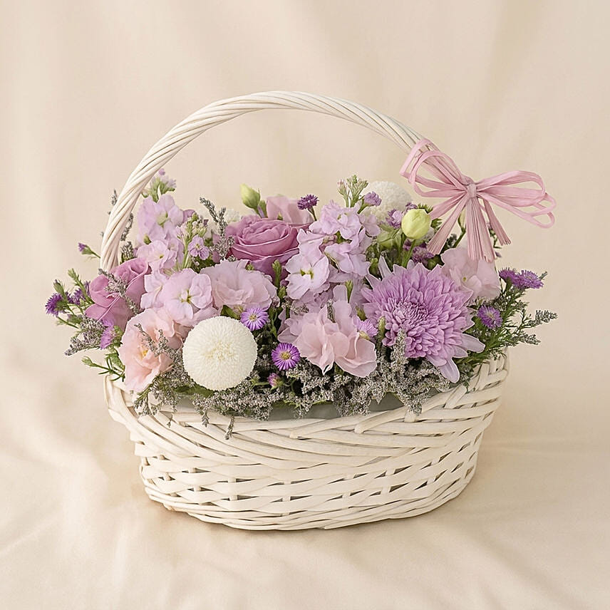 Enticing Mixed Flowers Round Basket: Basket Arrangements 