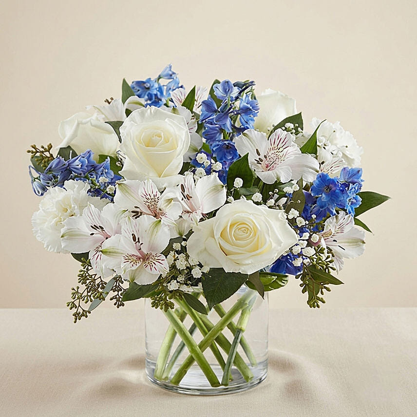 Blue And White Floral Bunch In Glass Vase: Clementi Florist