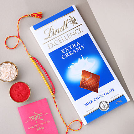 Sneh Red and Yellow Bead with Lindt Extra Creamy Milk : Rakhi Combos