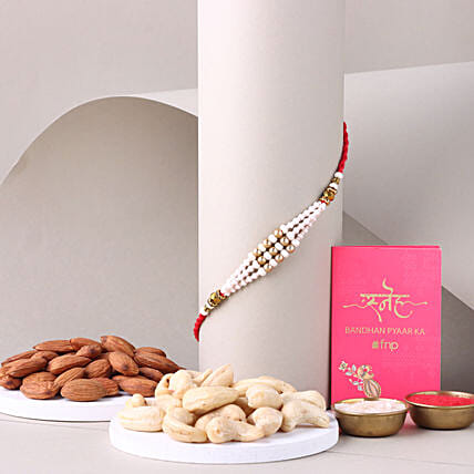 Sneh White Pearl Bead Rakhi with Almonds: 