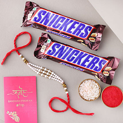 Sneh White Pearl Bead Rakhi with Snickers Chocolate: 