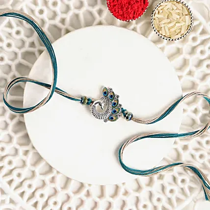 Sapphire Serenity Peacock Rakhi: Designer Rakhi