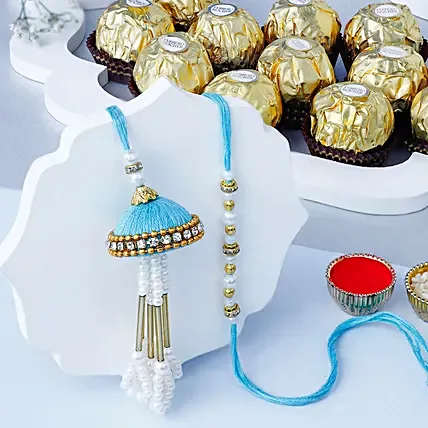 Tranquil Jhumar Bhaiya Bhabhi Pearl Rakhi Set N Ferrero Delight: Rakhi Sets