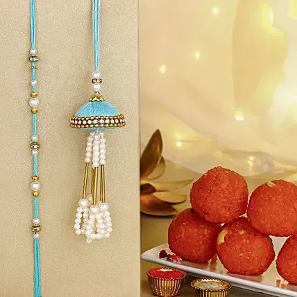 Tranquil Jhumar Bhaiya Bhabhi Pearl Rakhi Set N Sweet Delight: 