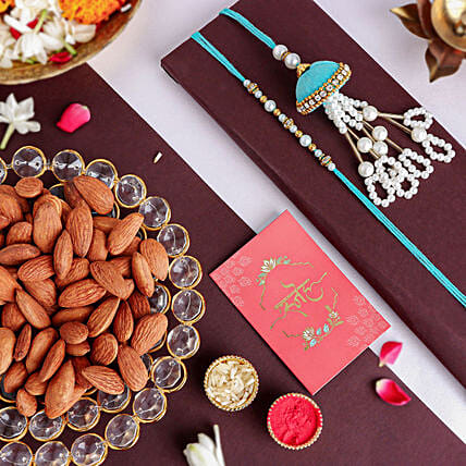 Tranquil Teal Jhumar Bhaiya Bhabhi Pearl Rakhi Set N Nutty Duo: 